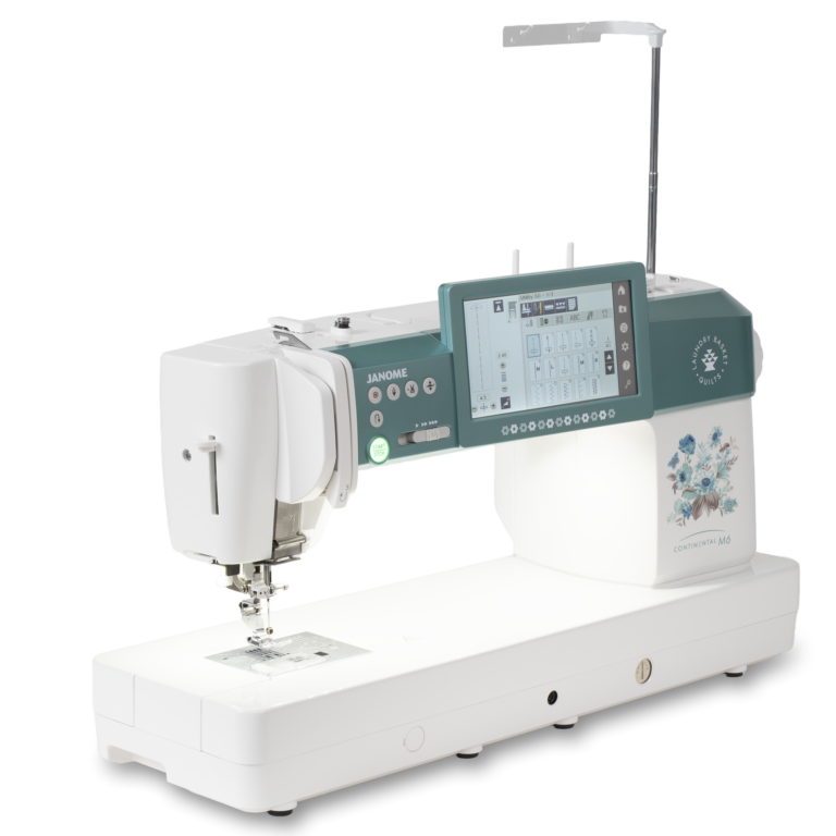 Janome Continental M6 sewing and quilting machine with teal control panel and large touchscreen