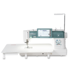 Janome Continental M6 sewing and quilting machine with teal control panel and detachable extension table.