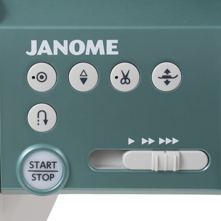 Janome Continental M6 sewing machine control panel in teal with Start/Stop button and navigation controls