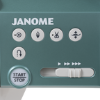 Janome Continental M6 sewing machine control panel in teal with Start/Stop button and navigation controls