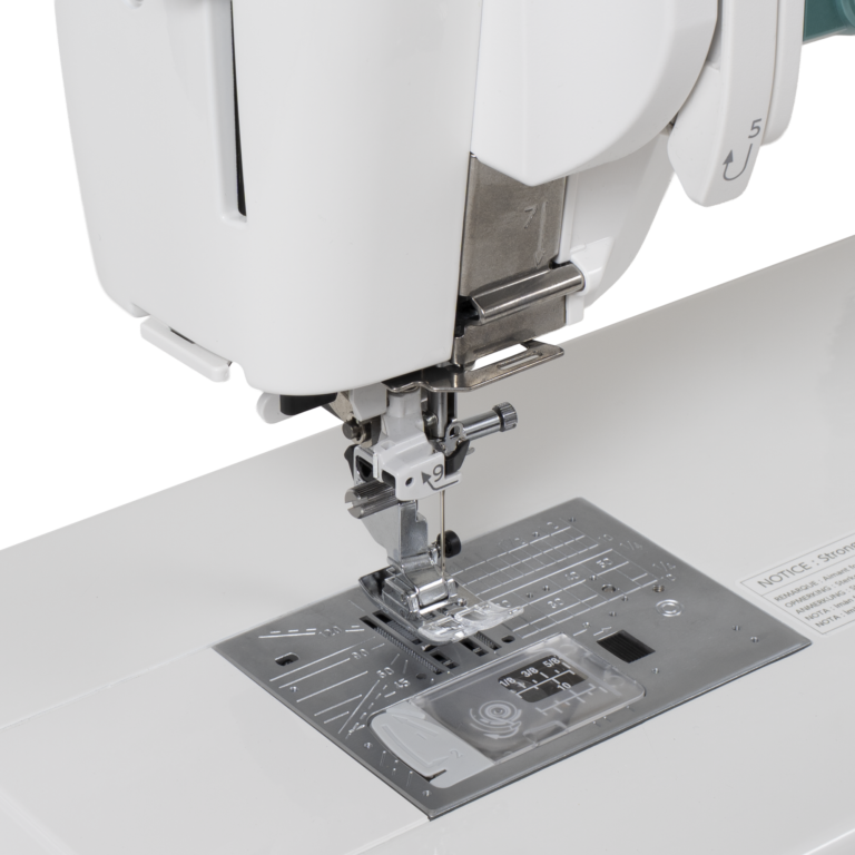 Janome Continental M6 sewing and quilting machine, white body with metal throat plate and presser foot