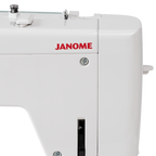 Janome Continental M6 sewing machine; white body with red JANOME logo visible.