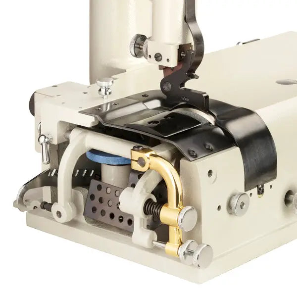 Consew DCS-S4 Skiving Machine with assembled table and servo motor, beige metal body