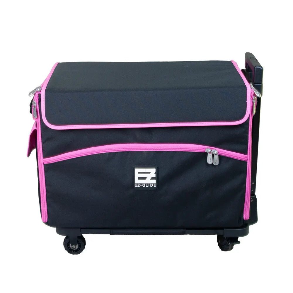 21-inch EZ-Glide trolley sewing box by Tutto, black with pink trim.