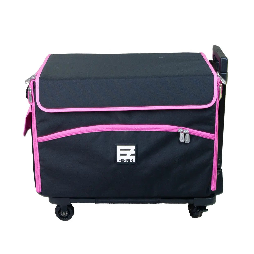 21-inch EZ-Glide trolley sewing box by Tutto, black with pink trim.