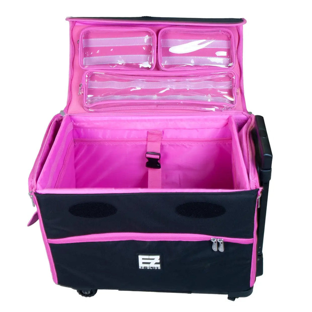 21in EZ-Glide Trolley by Tutto; pink interior, black exterior, clear lid pockets for a sewing box on wheels.