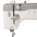 Janome HD9V3 heavy-duty sewing and quilting machine, white with gray top.
