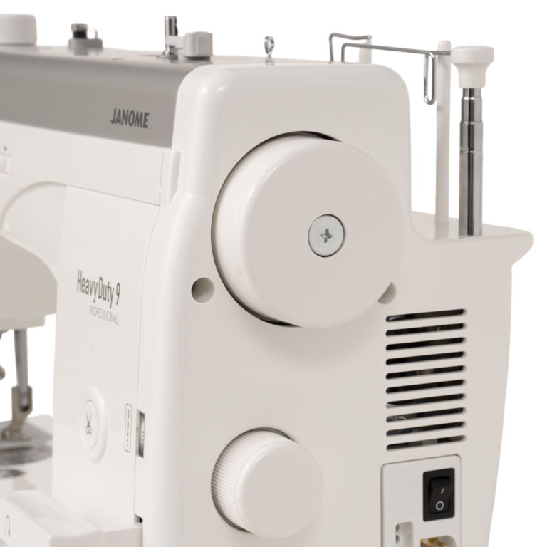 Janome HeavyDuty 9 Professional sewing and quilting machine in white.