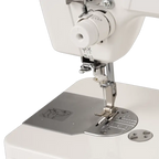 Janome HD9V3 heavy-duty sewing and quilting machine, white mechanical model with metal needle plate and presser foot.