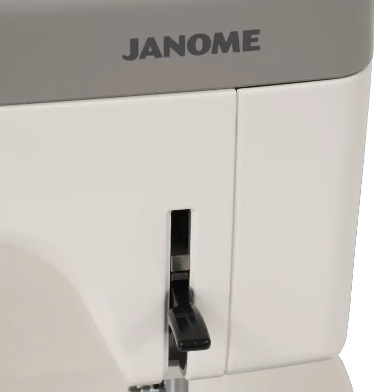 Janome HD9V3 heavy-duty sewing & quilting machine; gray lid with logo and white body, lever control visible