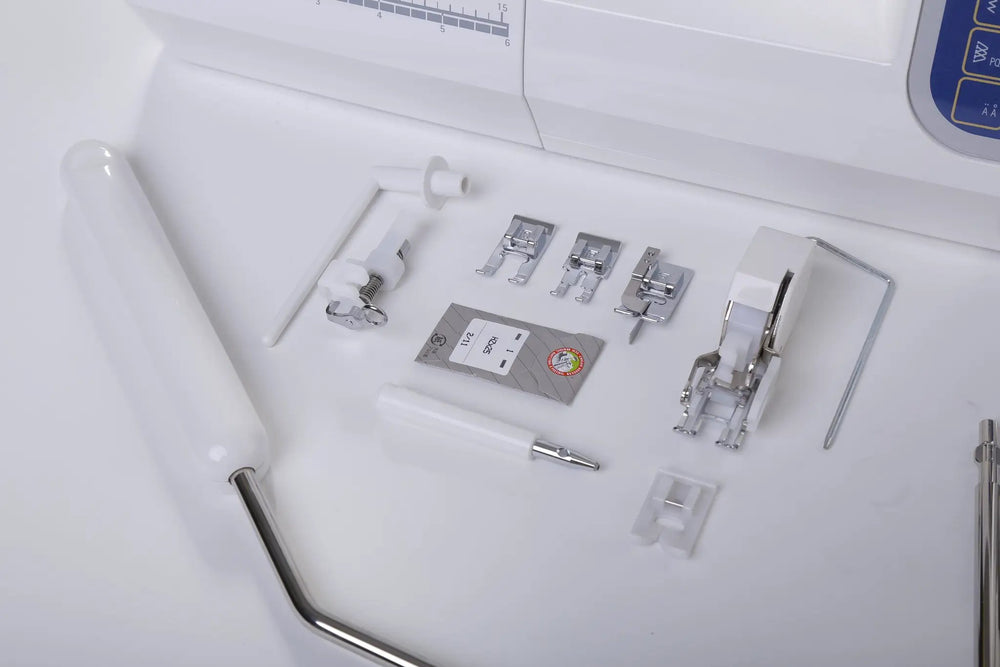 Juki HZL-DX7 computerized sewing machine with white finish and presser feet set.