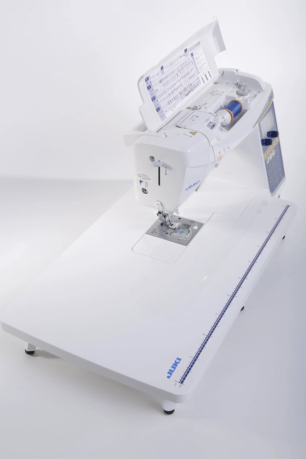 Juki HZL-DX7 computerized sewing machine in white with a large extension table.