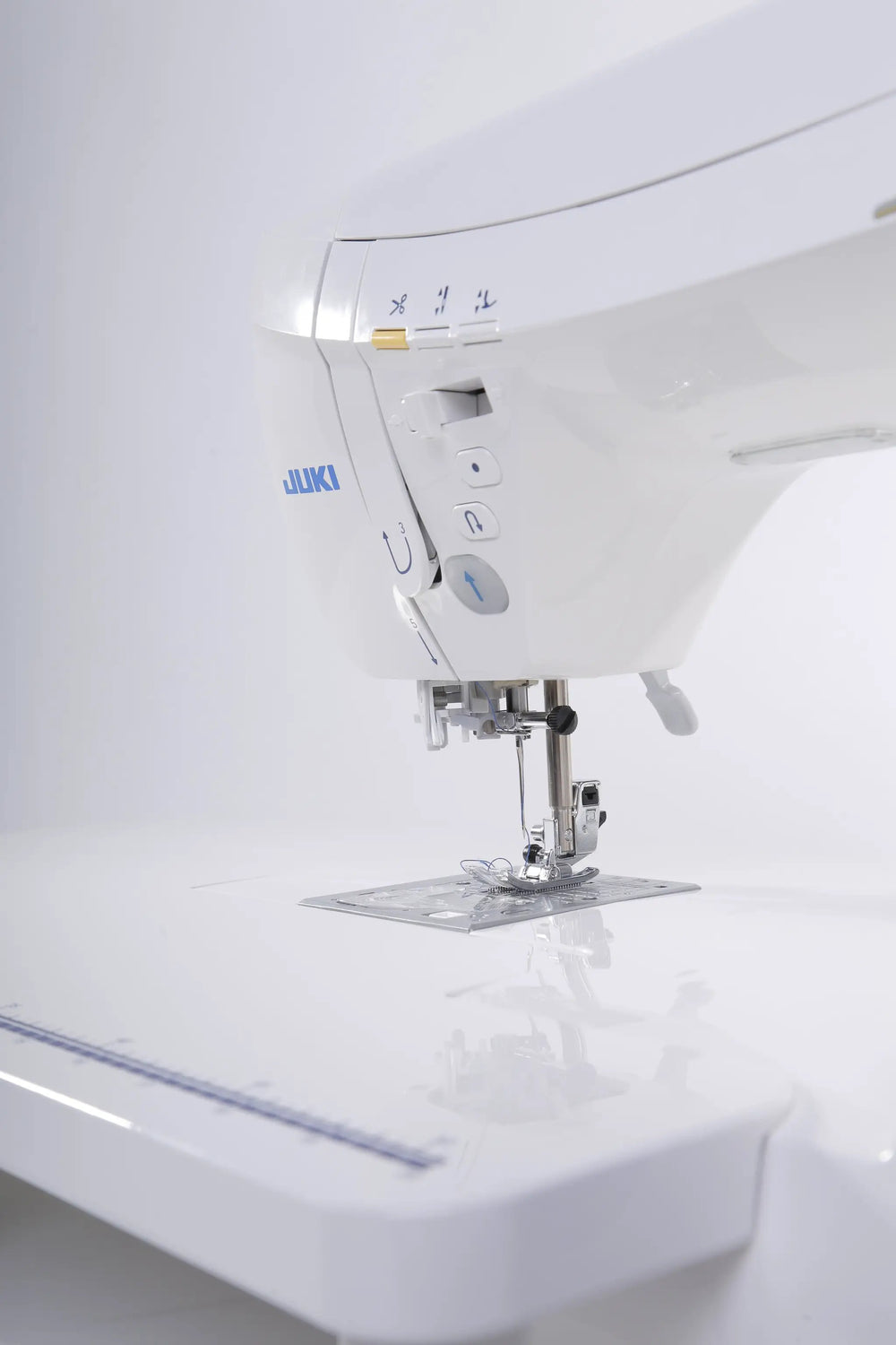 Juki HZL-DX7 computerized sewing machine in white, side view