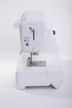 Juki HZL-DX7 computerized sewing machine, white body, compact design.