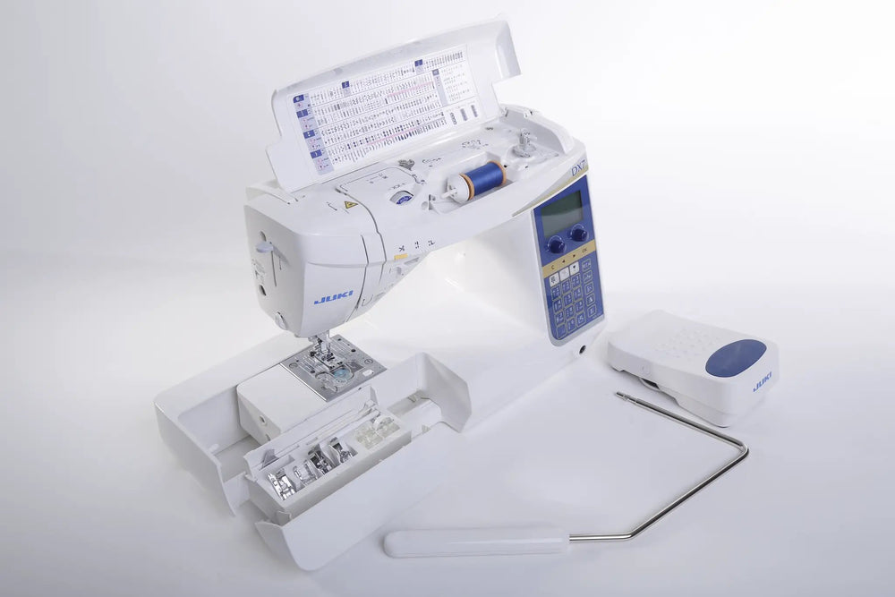 Juki HZL-DX7 computerized sewing machine with blue control panel and built-in threading chart.