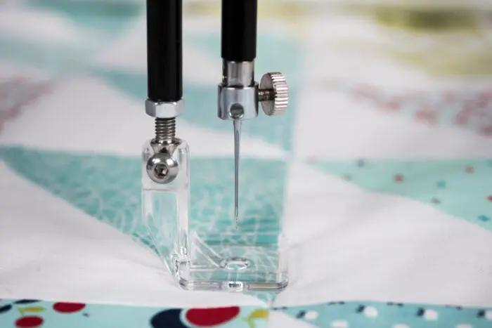Handi Quilter HQ Quick Change Mount Square Feet Kit two presser feet; transparent square foot with metal fittings.