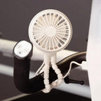 HQ Handi Fan by Handi Quilter; white handheld fan with circular grill and built-in control pad