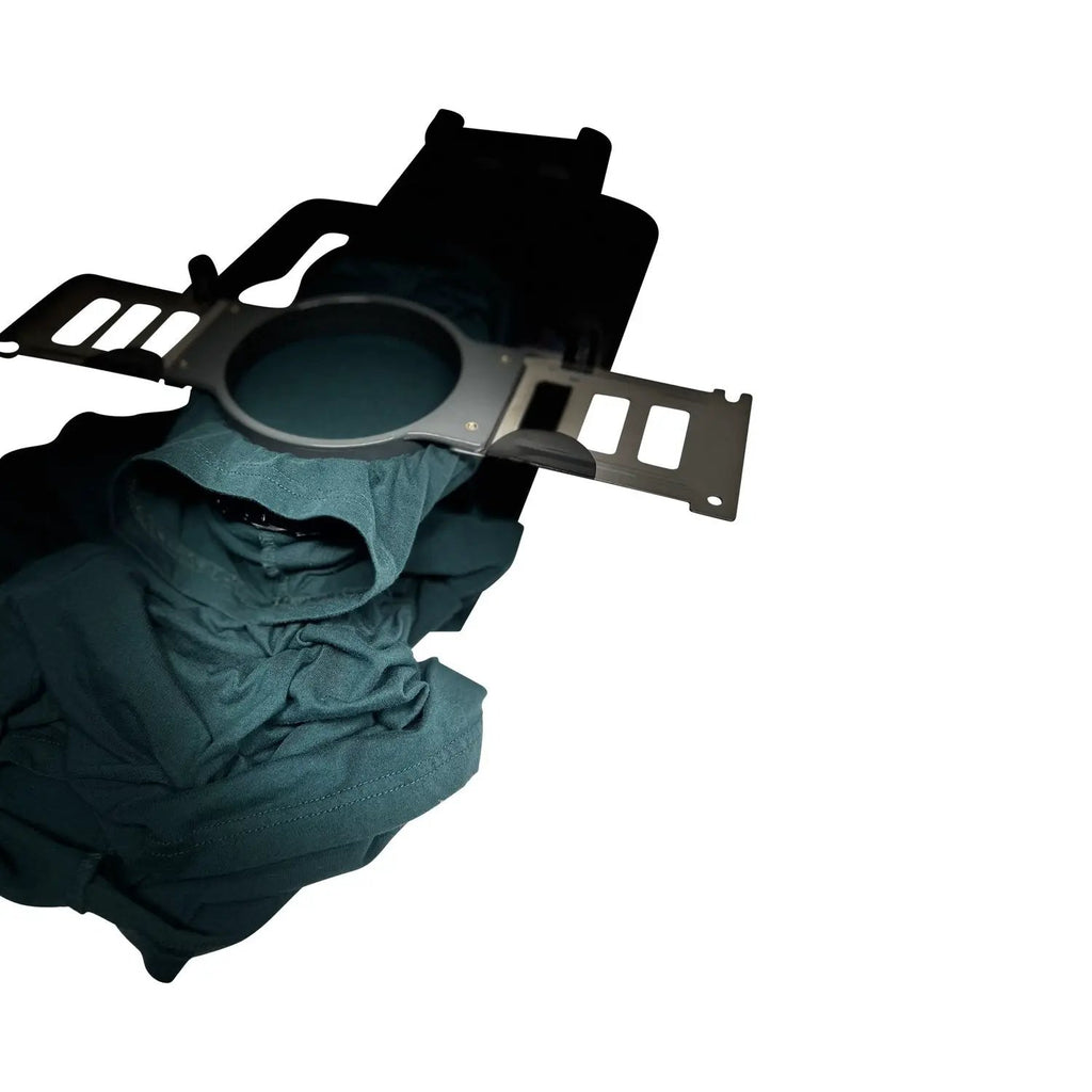 Hooper Mini with Combo Bracket System metal bracket held by teal-gloved hand
