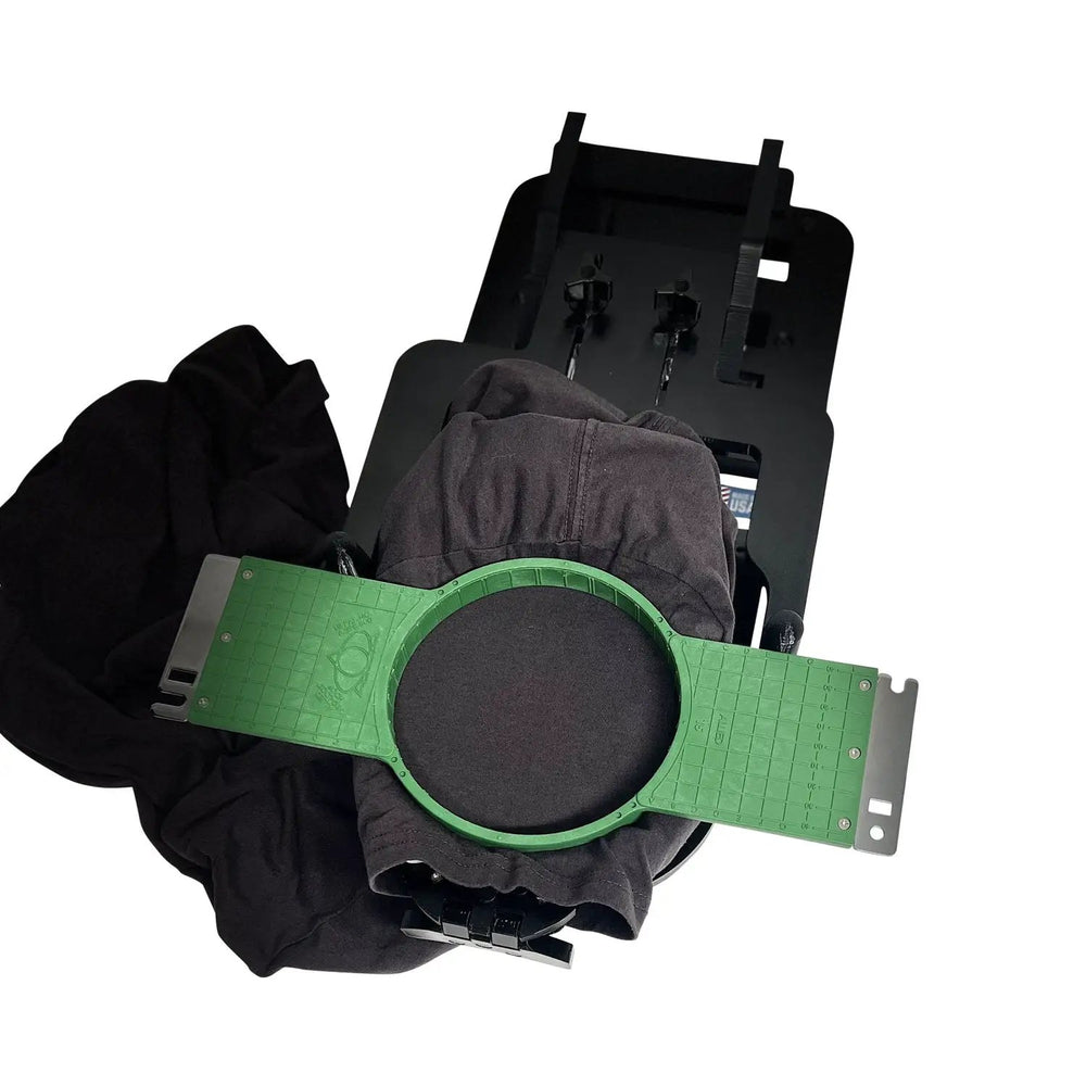 Hooper Mini with Combo Bracket System hooping station by Tex Inc, green adjustable bracket on a black mounting plate