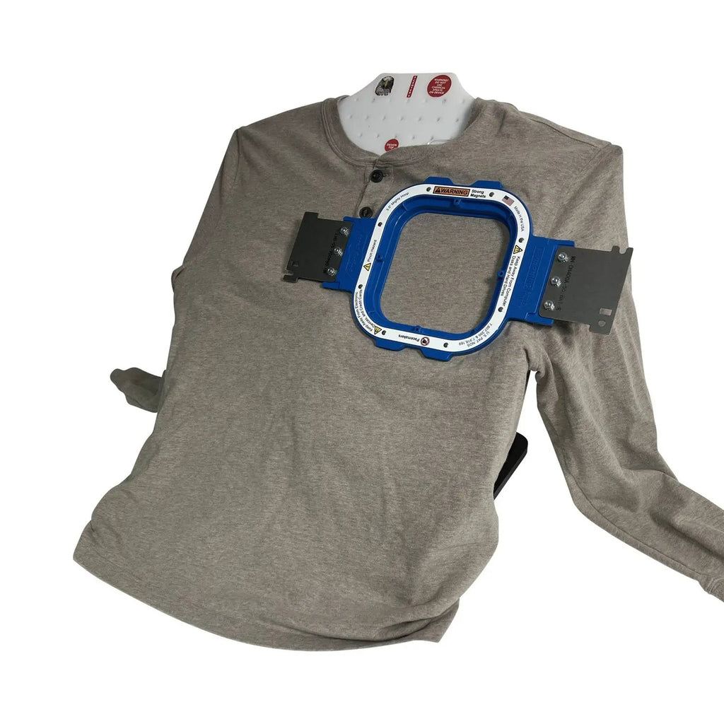 Hooping Station Tex Inc Hooper One + Leveler Pro Plus with Mighty & Standard Hoop Brackets, blue frame on gray shirt