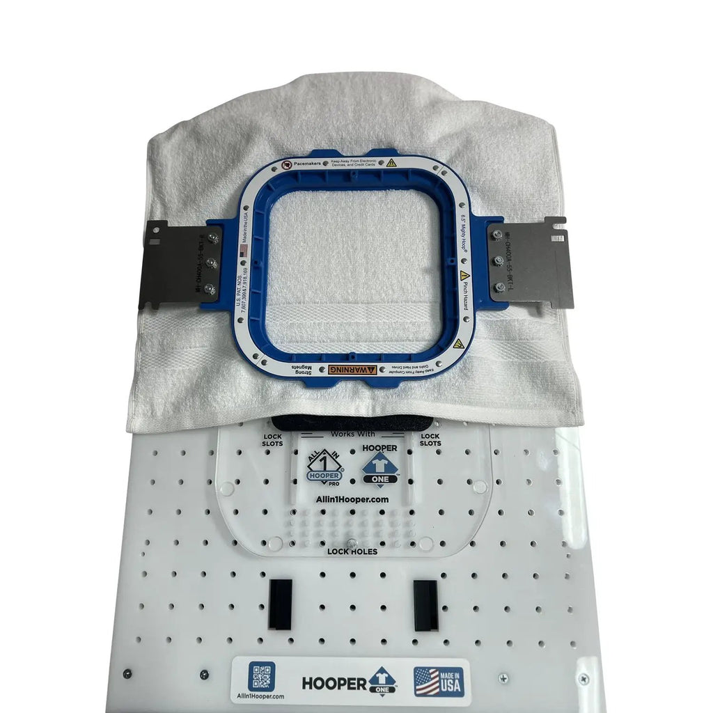 Hooper One + Leveler Pro Plus embroidery hoop system mounted on a stand, blue square hoop with silver brackets
