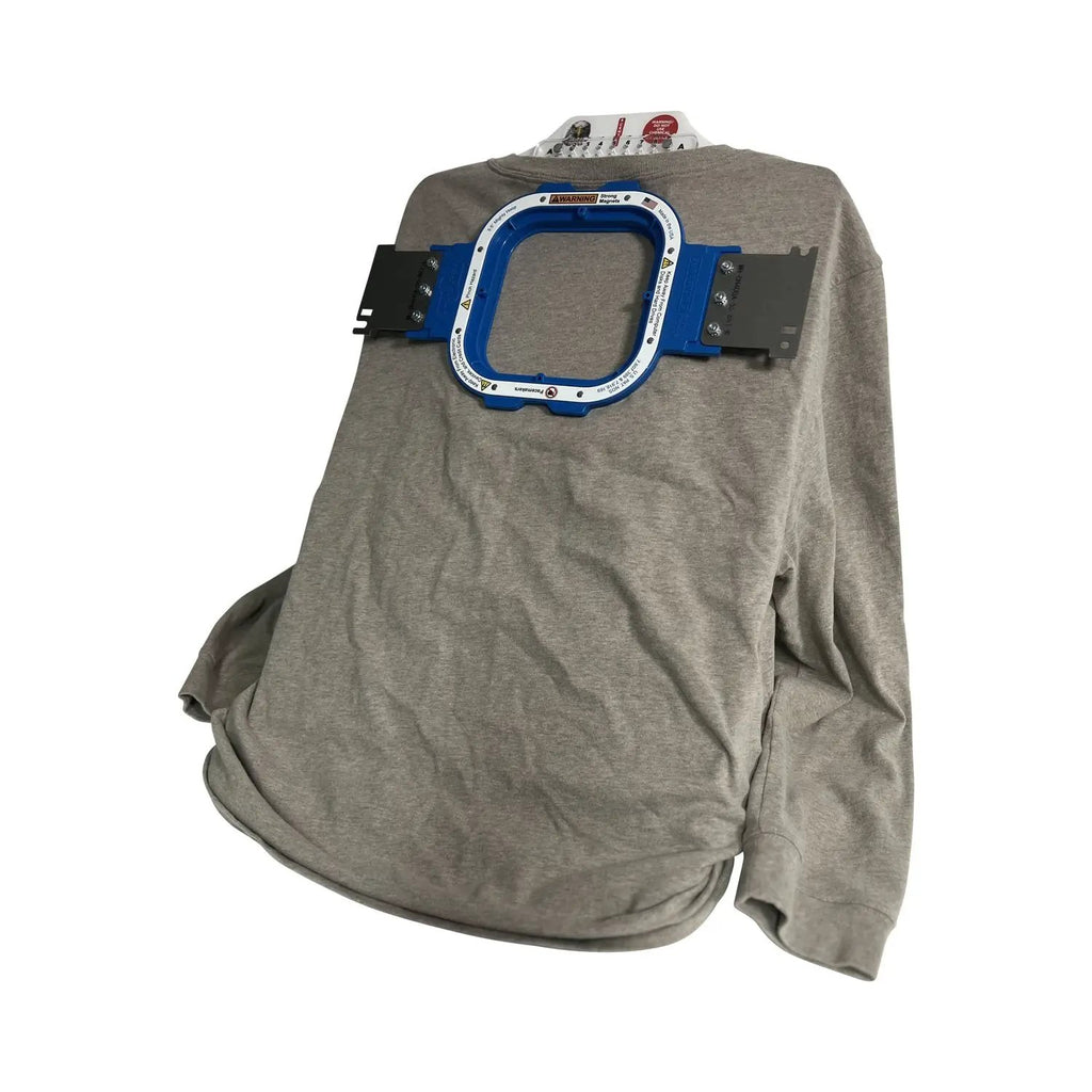 Hooper One + Leveler Pro Plus hoop combo brackets mounted on a gray sweatshirt, Tex Inc embroidery hooping station.