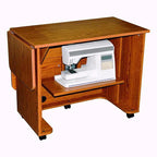 Horn 5230AL Space Saver Cabinet, wooden sewing cabinet with a sewing machine on the shelf.