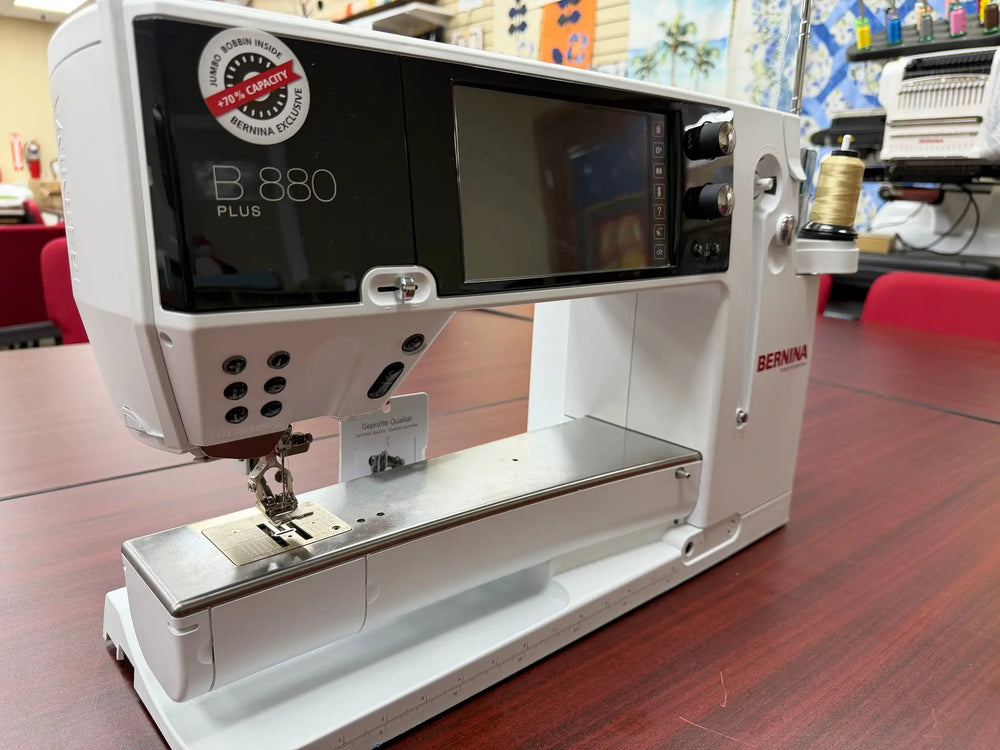 Bernina 880 Plus computerized sewing and embroidery machine in white with touchscreen display