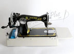 Janome 131HDL hand-crank sewing machine with black body and floral decals on white base