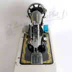 Janome 131HDL hand-crank sewing machine; black head with ornate metal details on a white base.