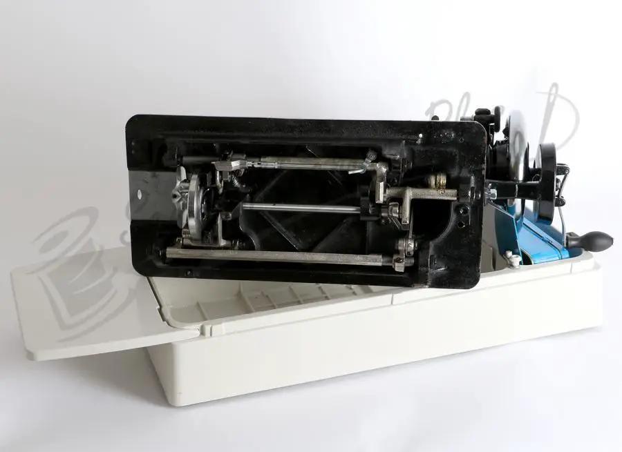 Janome 131HDL hand crank sewing machine head on white stand