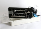 Janome 131HDL hand crank sewing machine head on white stand