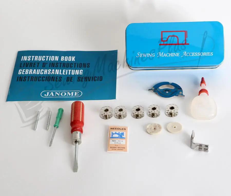 Janome 131HDL hand crank sewing machine accessories kit with instruction book, blue tin, needles, feet, oil bottle