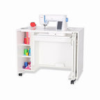 Arrow Mod sewing cabinet, white rolling unit with left spool shelves and top-mounted sewing machine.