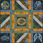 Anita Goodesign embroidery designs: Free Motion Frenzy quilt panel with peace, love, wings and honor motifs in blue, green and orange.