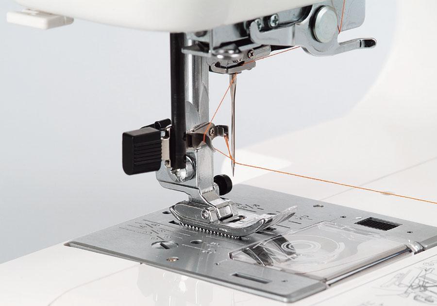 Janome Jem Gold Plus Portable Sewing Machine with Light Serging System