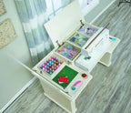 Koala Studios Sewing Station Cabinet, white finish with built-in sewing machine and organized thread spools