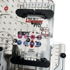 All in 1 Leveler Pro hooping station with black foam alignment bars on a white panel featuring measurement rulers.