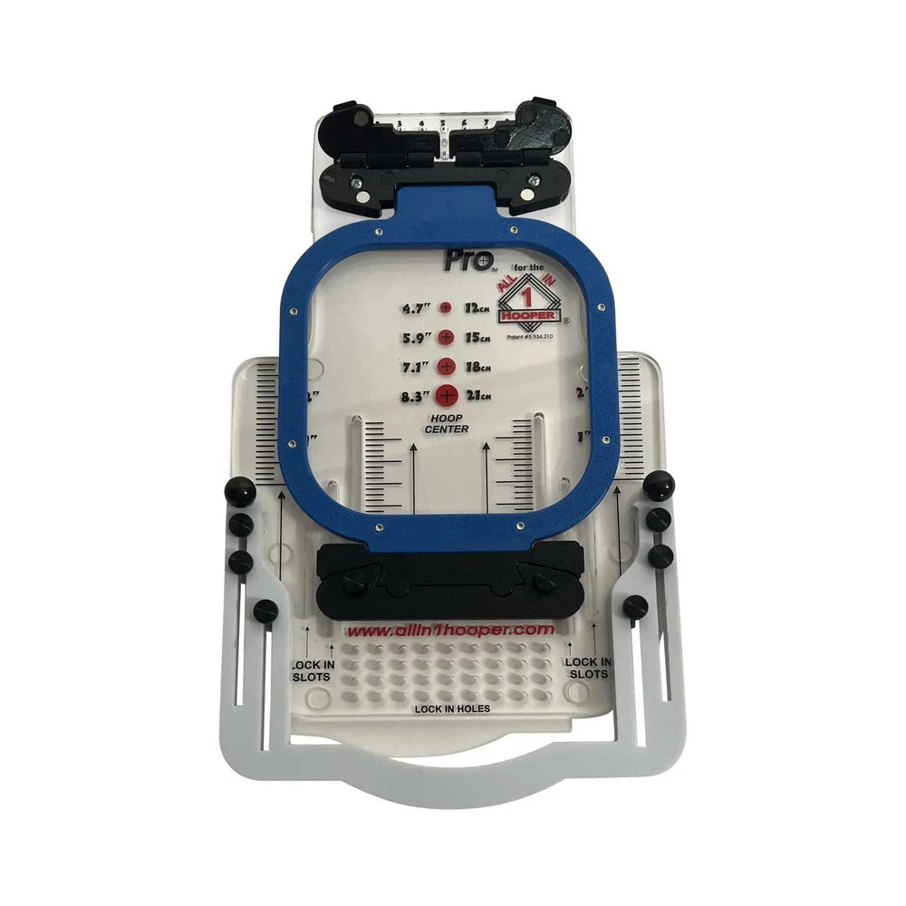 All in 1 Leveler Pro hooping station by Tex Inc, blue frame with measurement grid and lock-in holes.