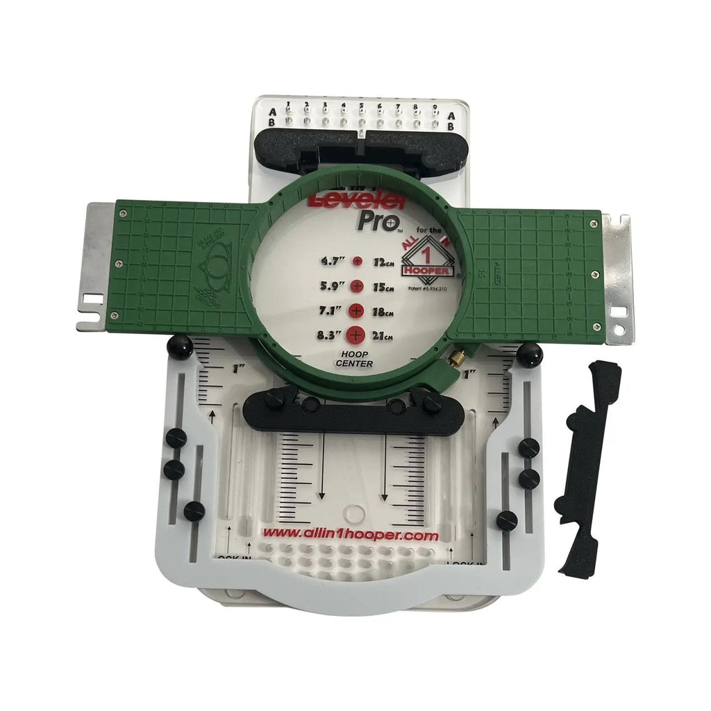 All in 1 Leveler Pro hooping station by Tex Inc with green circular hoop on white base