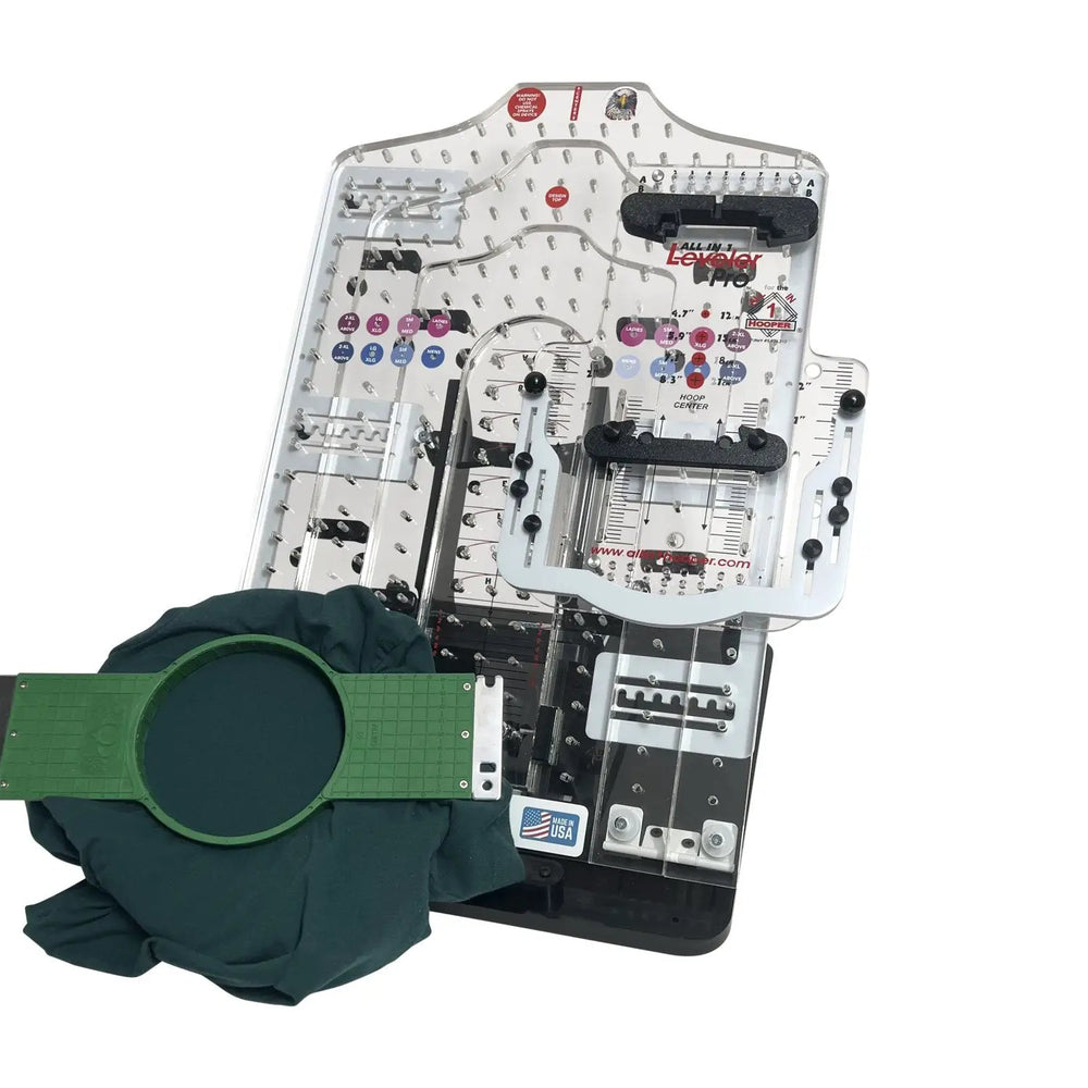 All in 1 Leveler Pro hooping station by Tex Inc with clear base and measurement grid