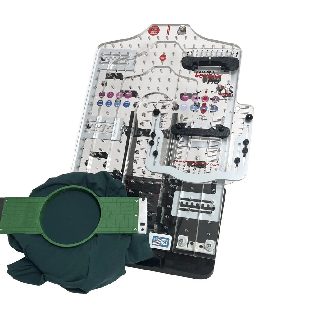 All in 1 Leveler Pro hooping station by Tex Inc with clear base and measurement grid