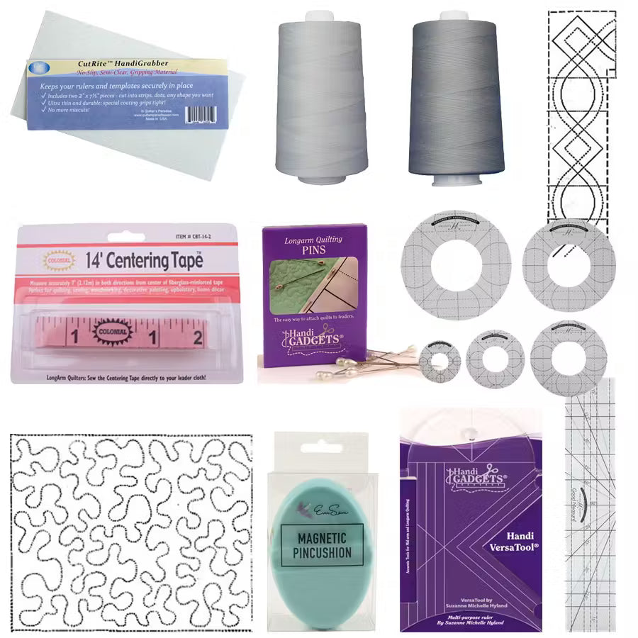 Collection of quilting tools and materials including thread, rulers, and accessories 
