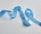 Brother P-Touch Embellish blue satin ribbon, 1 inch, with gold lettering