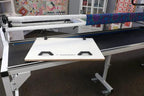 Multi-Use Board Kit - HQ on Handi Quilter quilting frame; white board with black handles