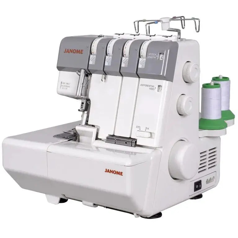 Janome MyLock 654D serger, white and gray with green-thread spools