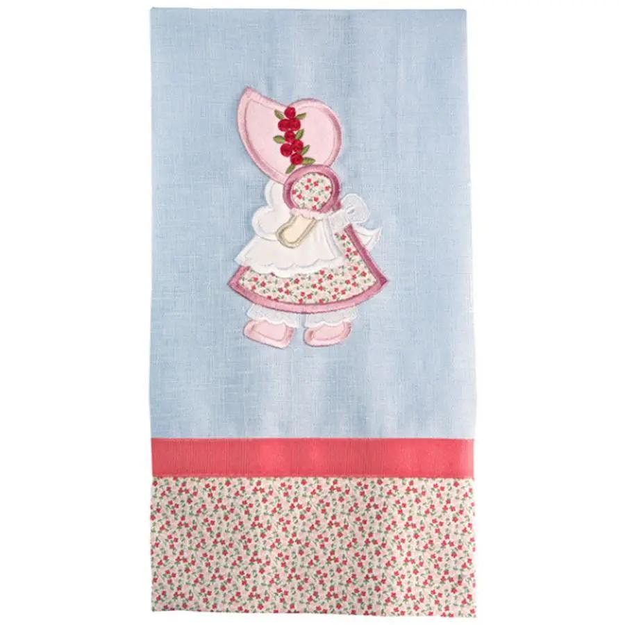 Anita Goodesign Sunbonnet Sue and Sam embroidery design on light blue fabric panel with pink trim and floral bottom