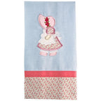 Anita Goodesign Sunbonnet Sue and Sam embroidery design on light blue fabric panel with pink trim and floral bottom