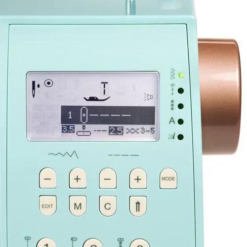 EverSewn Sparrow 30S sewing machine in mint teal with LCD display panel