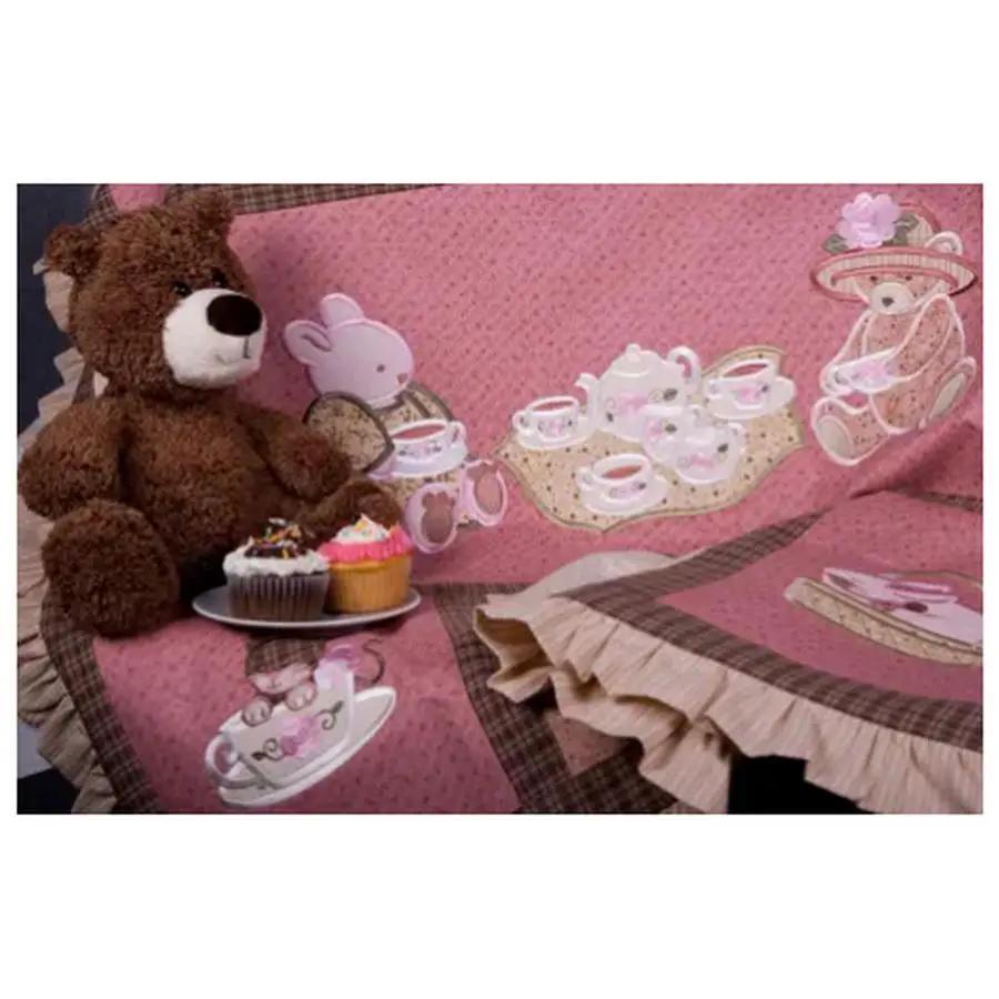 Anita Goodesign Baby Tea Party embroidery design software, pink tea party scene with a teddy bear and cupcakes